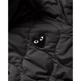 COMME des GARÇONS PLAY quilted hooded jacket, close up with black heart embroidery