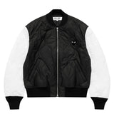 COMME des GARÇONS PLAY quilted bomber jacket in black with white sleeves and black heart logo, front view