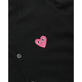 COMME des GARÇONS PLAY black wool cardigan with small pink heart logo, close up